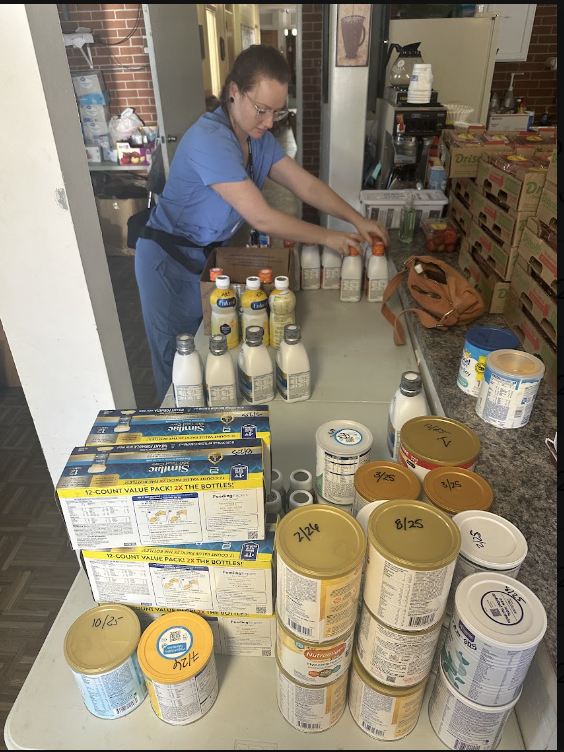 SAFE Volunteer sorting formula bottles